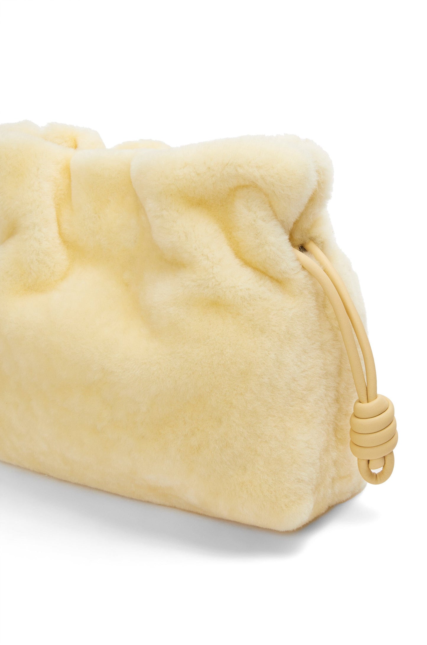 Flamenco clutch in shearling