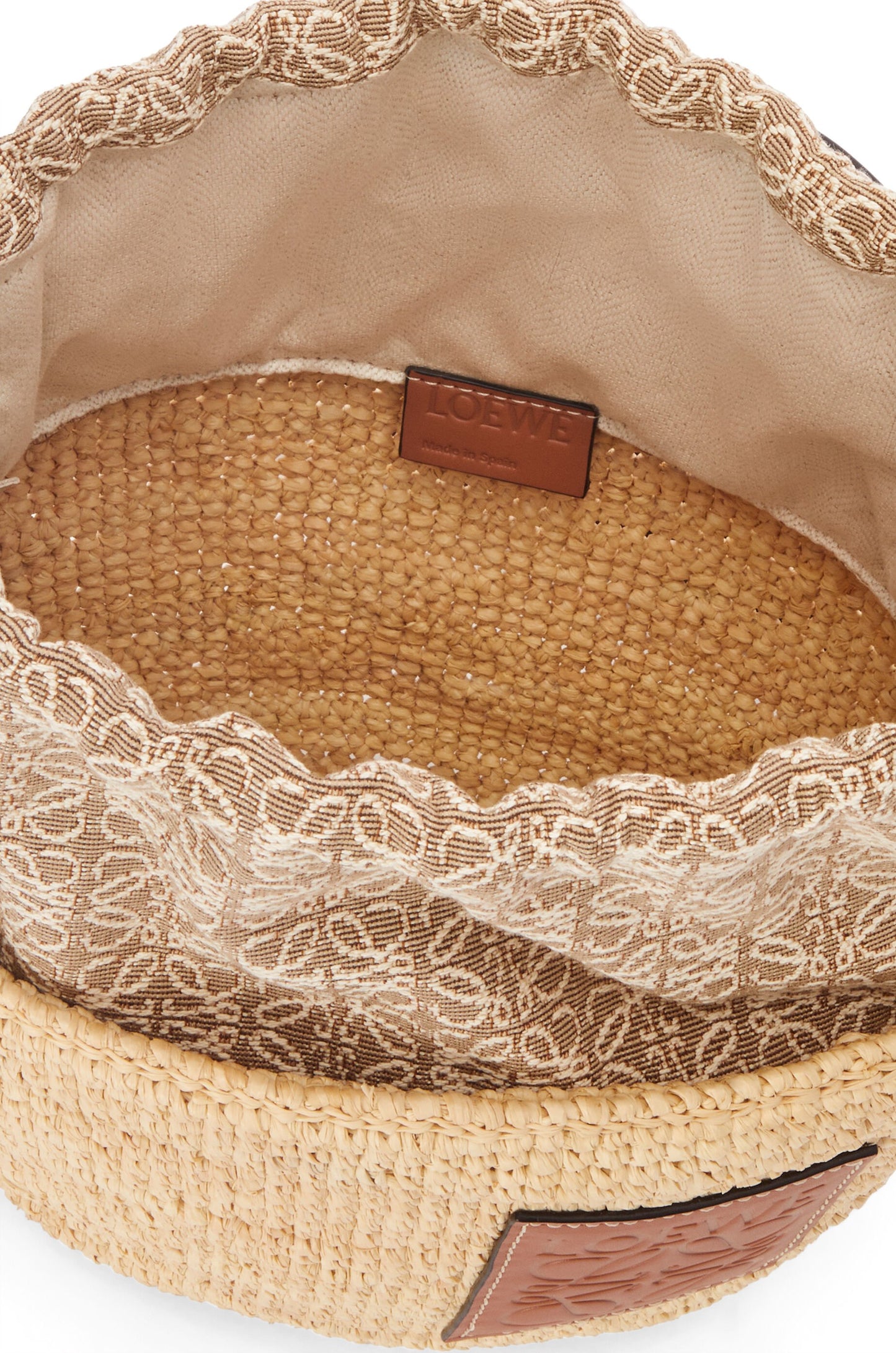 Pochette bag in raffia and calfskin