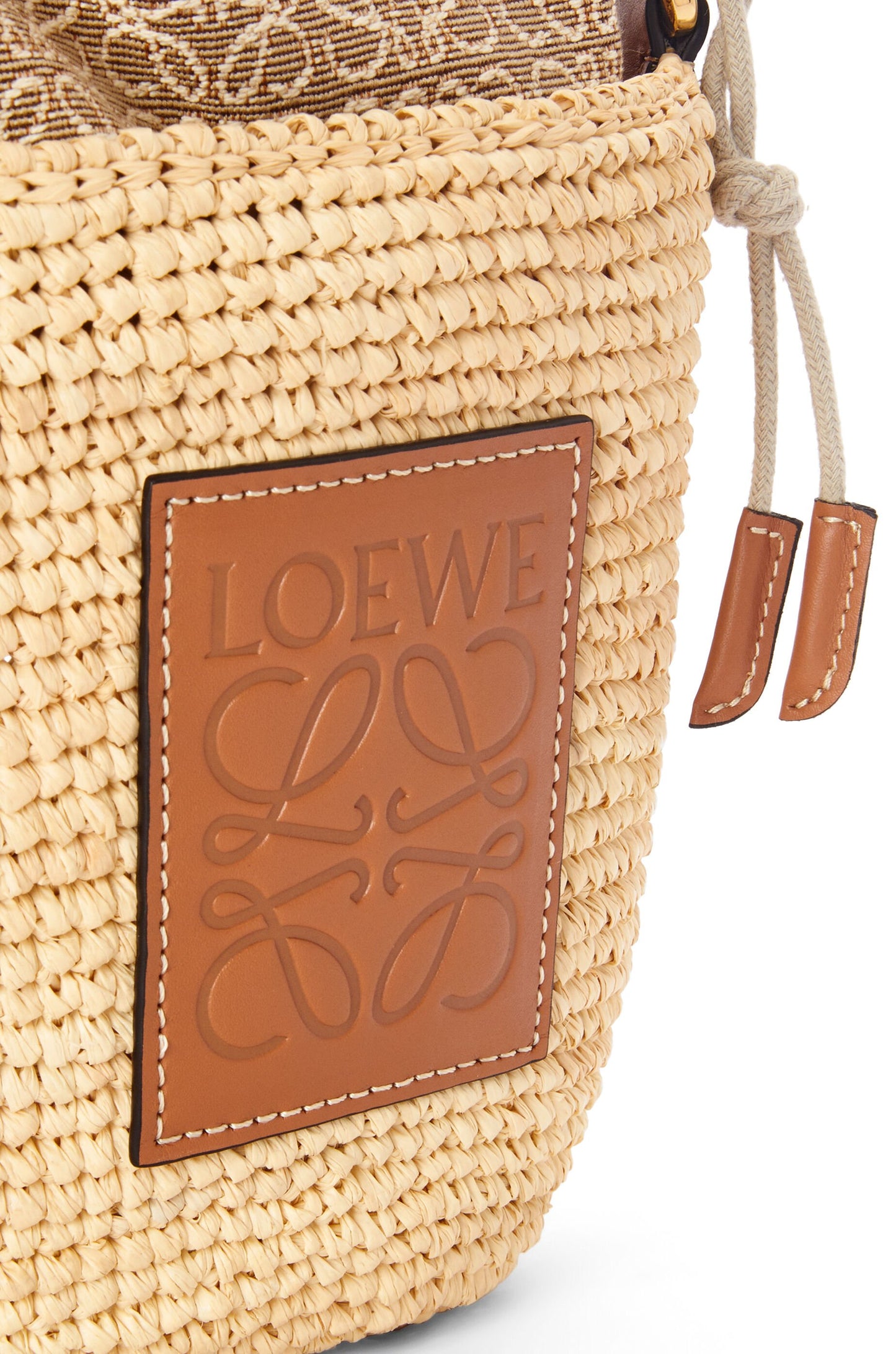 Pochette bag in raffia and calfskin