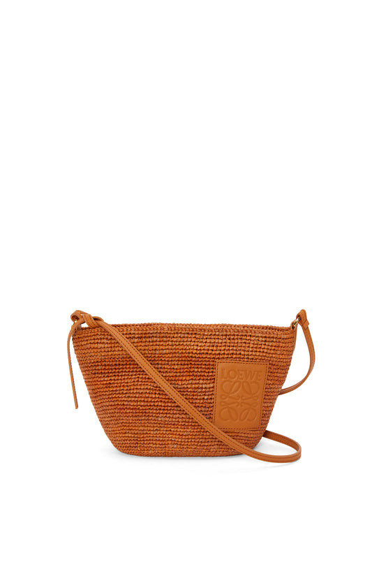 Slit Pochette bag in raffia and calfskin