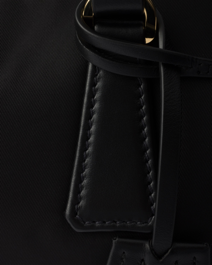 Re-nylon and leather medium top-handle bag with padlock