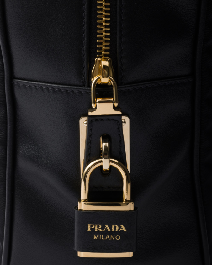 Large re-nylon and leather top-handle bag with padlock