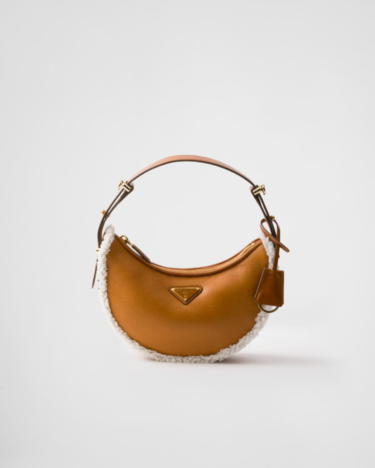 Prada arqué small shearling shoulder bag